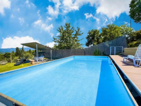Villa with above ground swimming pool in the rolling Tuscan hills with a beautiful view